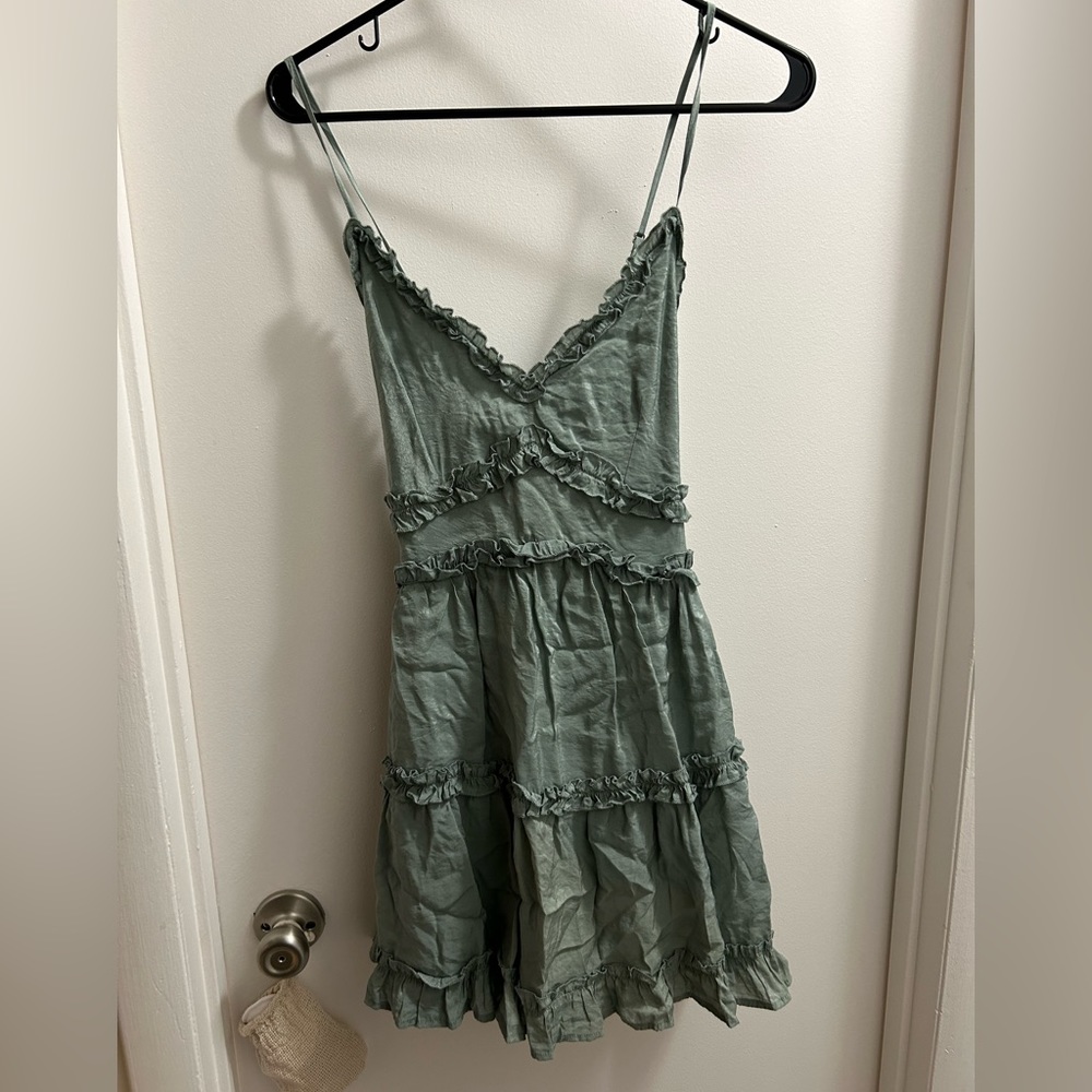 Green mini summer dress with cross back from Francesca’s